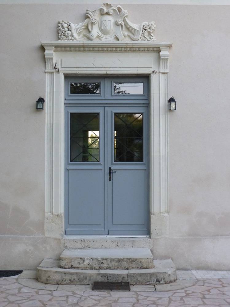 12 Porte d'entrée double, vitrée et imposte